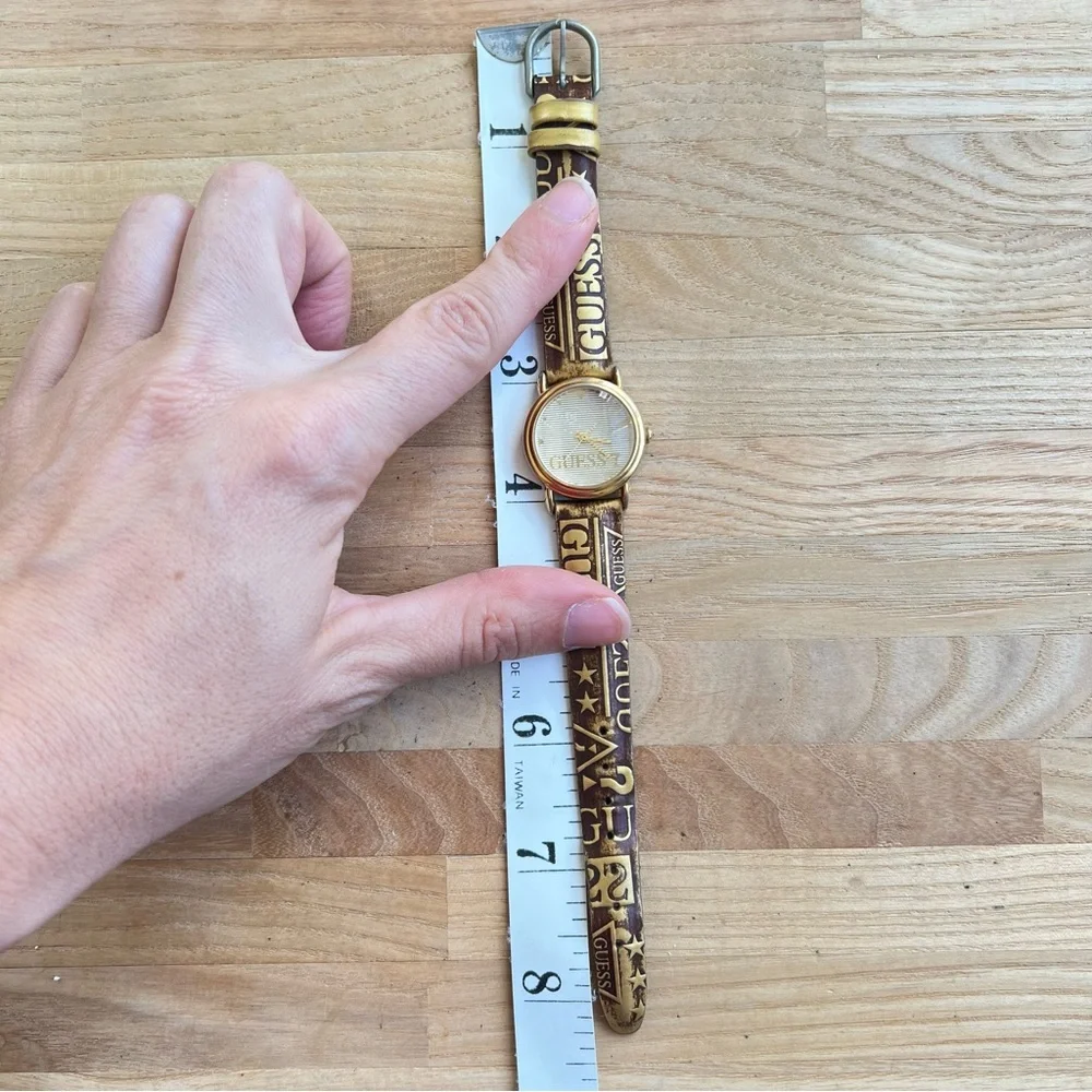 Vintage Guess ladies gold tone logo leather dress Watch NEW BATTERY
